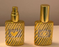 thumb_2426_1.2_oz_gold_laminated_spray_bottle._Dome_shape.jpg